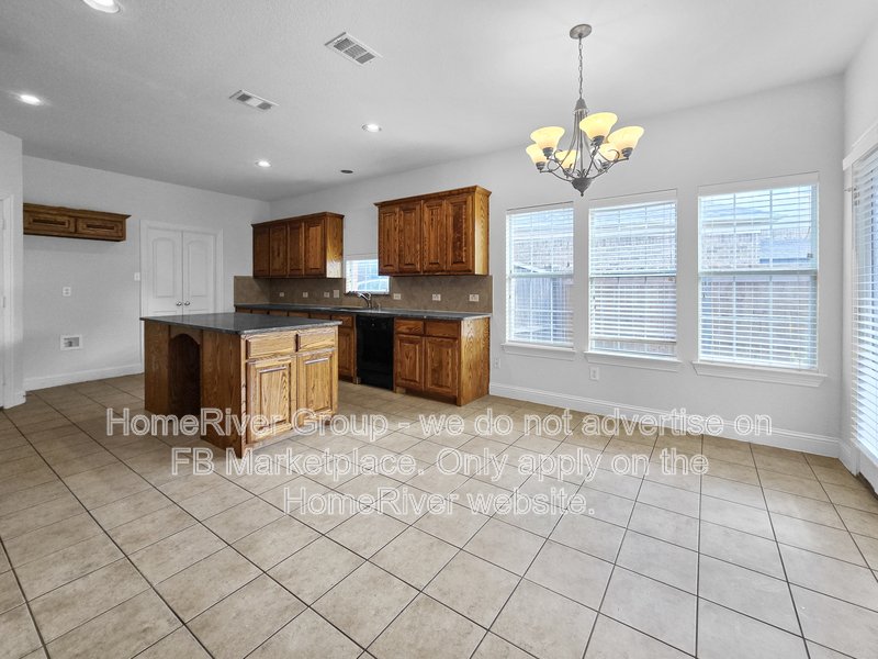Spacious 4BR with Covered Patio | Fireplace | Refrigerator property image