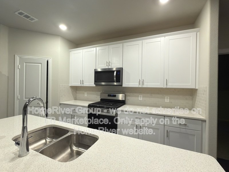 4 BR Home | Quartz Counters | Covered Patio | Refrigerator property image