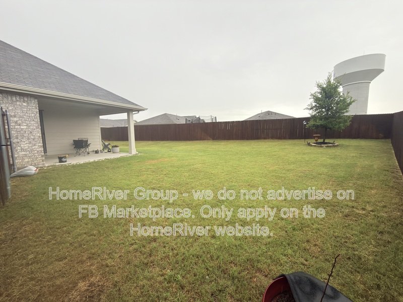 4 BR Home | Quartz Counters | Covered Patio | Refrigerator property image