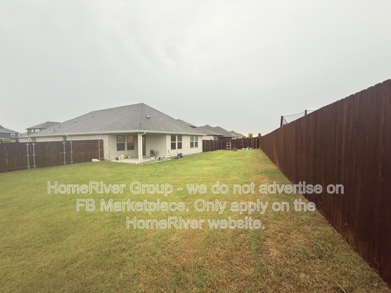 4 BR Home | Quartz Counters | Covered Patio | Refrigerator property image