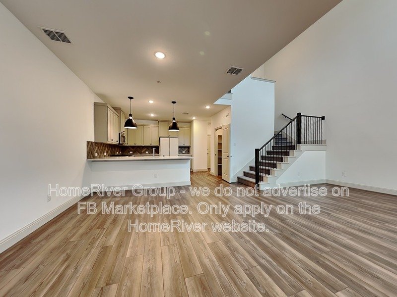 SS Appliances | Chef Kitchen | Solid Surface Flooring | Frisco ISD property image